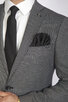 Pánský oblek Oliver – detail přední části obleku a kapsy